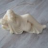 Bougie Artisanale parfumée Bouddha sur sofa